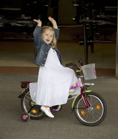 This is a real princes, not OURS.  Princess Amalia, Dutch heir, riding HER bicycle. But I am sure our girl sees herself as a princess riding her beautiful bicycle.  