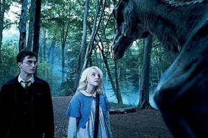Harry and Luna Lovegood with a thestral