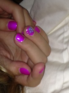 Still pretty as a picture, even after chasing frogs and skinks and riding her bike.