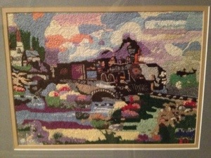 All those intricate stitches.  There's no telling how long this took her, sitting in her red chair, working away diligently.  She truly had a gift--of patience and with the needle.  