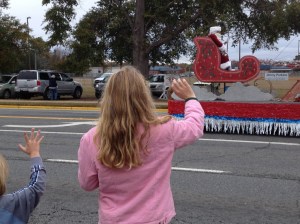 The littles were almost as excited to see Santa as they had been to see the red-caped Darth Vader.  It's where we live folks.  Star Wars-ville.  