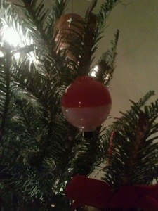 Love it! The ultimate fishing ornament--can be used year round.