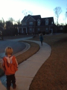 Returning home from our walk--that's our Princess up ahead skipping along.  Cooter even started skipping a few steps later.  