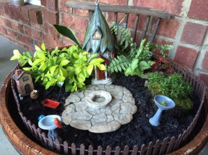 One arm made a lovely backdrop for our fairy garden.  
