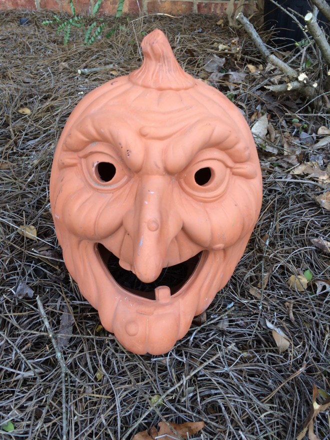 A little scary, but once she is sitting on a bale of hay with a mum or oooooh, a cauldron would be awesome, wouldn't it?  I'm sure we've got something around here.....